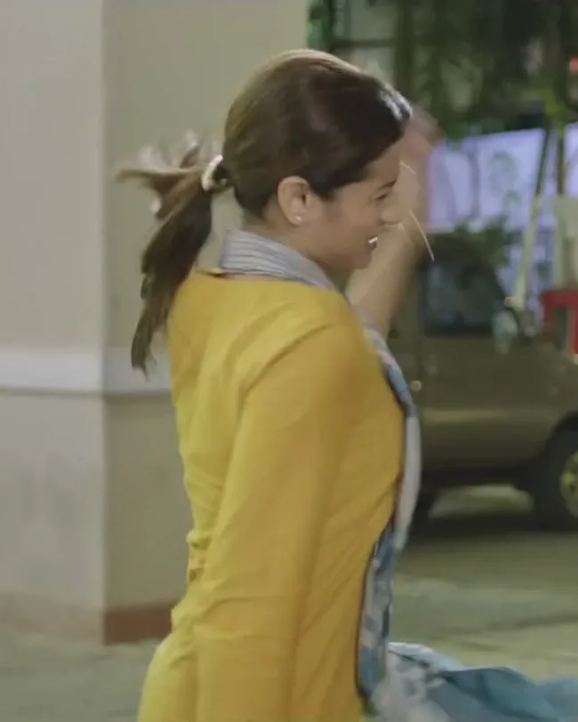 Trisha Krishnan — From the side — three-quarter sleeves and the straight, unshaped cut