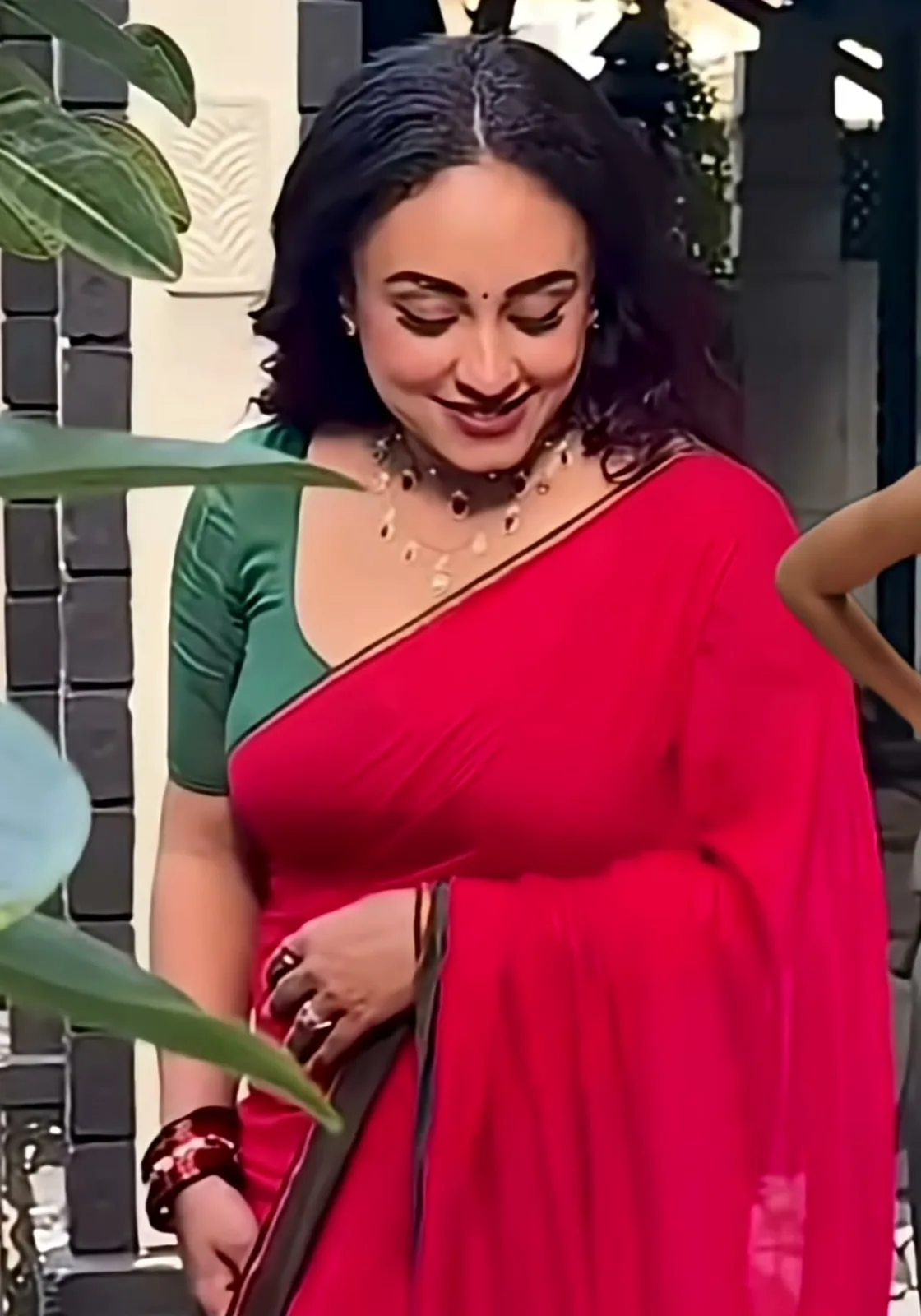 Pearle Maaney — Standing, looking down: how softly the cotton falls, and the border running the length of the pallu