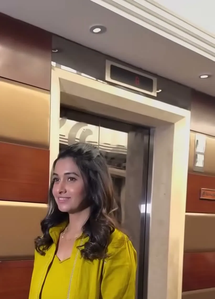 Priya Bhavani Shankar — The V-neck of the matching mustard inner, which is part of the same set rather than a separate top