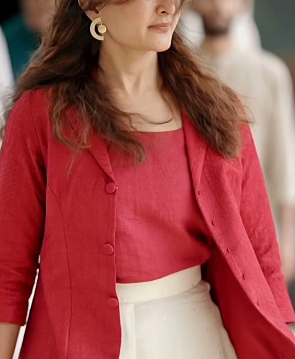 Manju Warrier — Close on the jacket: the notched collar, the self-covered buttons and the faint self-woven pattern in the cloth