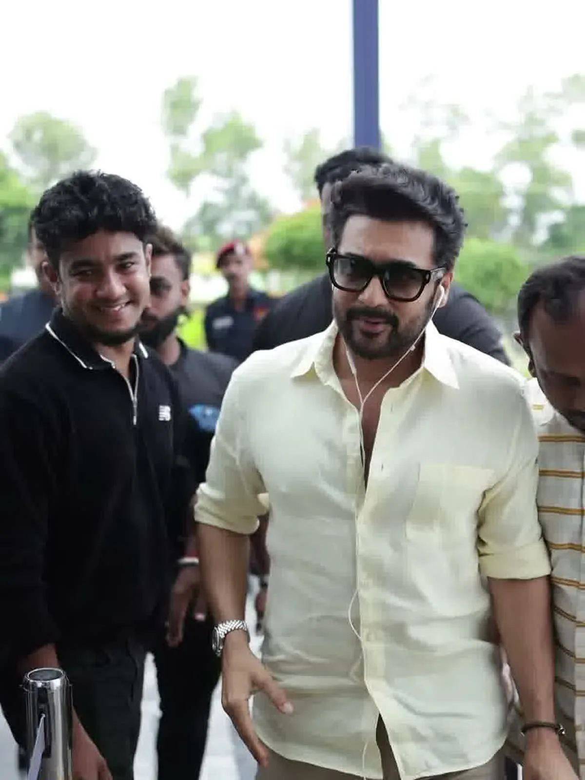 The pale yellow linen shirt — Suriya