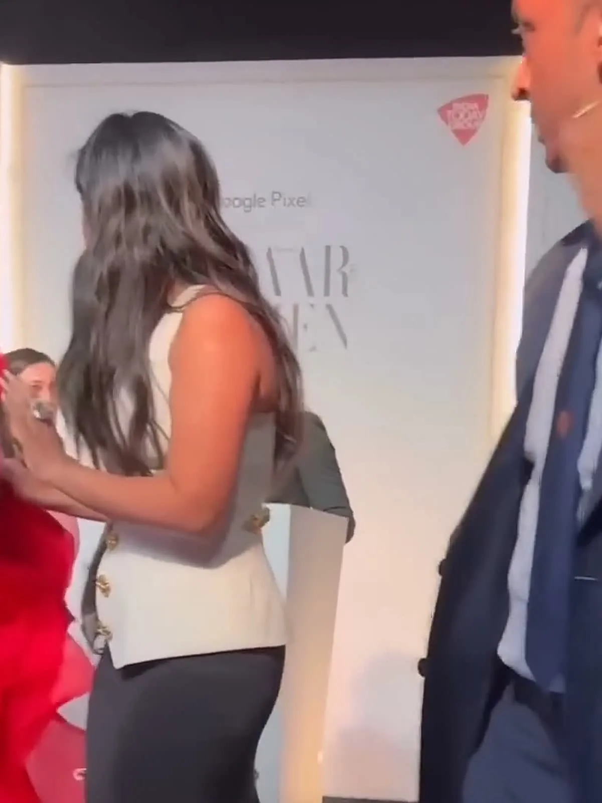 Isha Ambani — From behind: the shaped back panels and the seaming that pulls the waist in