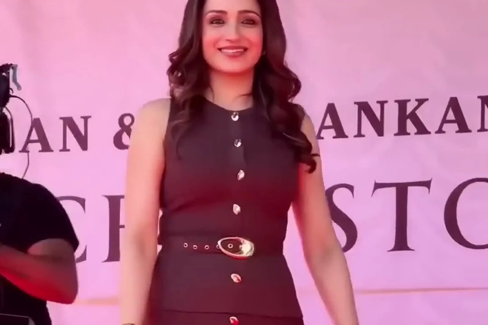 Trisha Krishnan — Where it was worn — the store-opening backdrop behind her