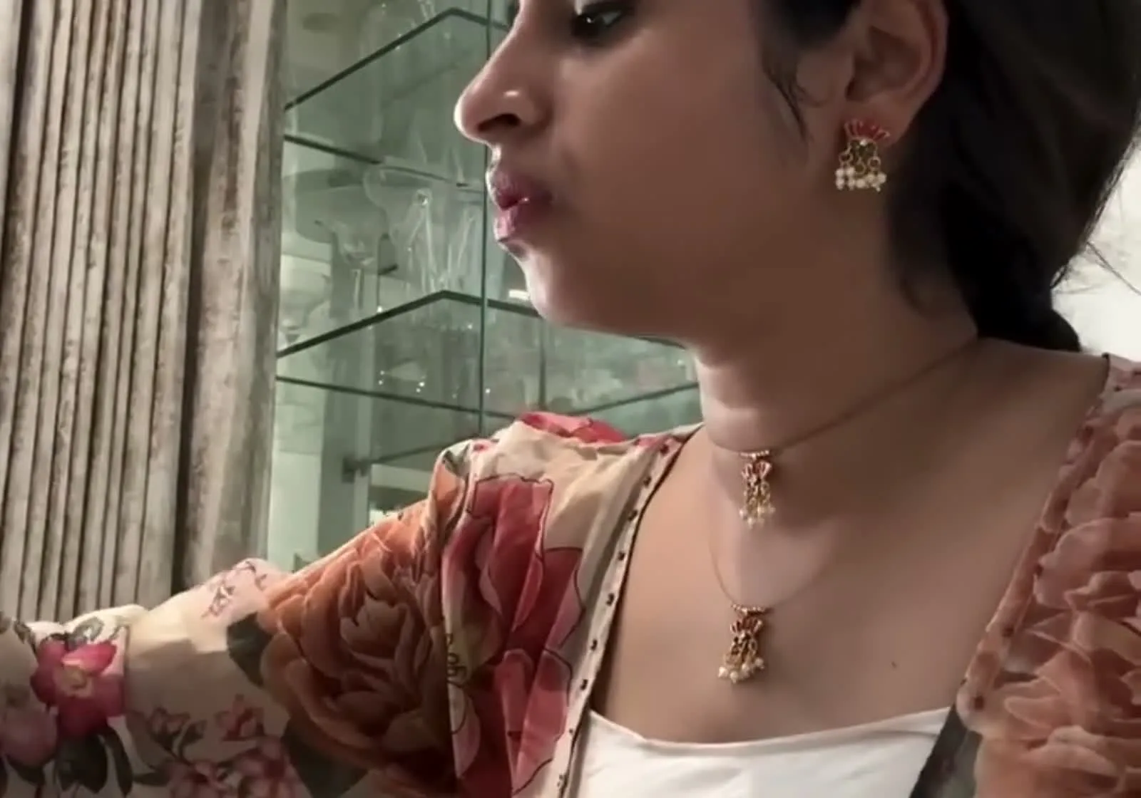 Sivaangi Krishnakumar — Reaching across — the puff at the shoulder and where the sleeve narrows to its cuff