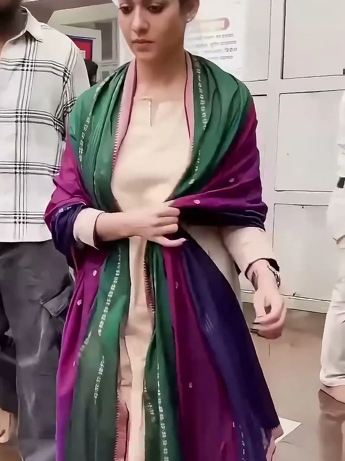 Nayanthara — Turned — the magenta half of the dupatta, and the zigzag pink border running down its edge