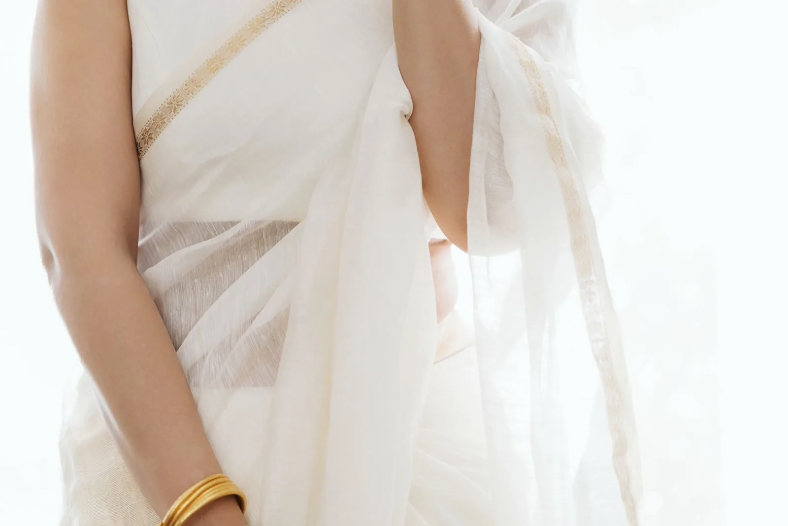 Nayanthara — The drape at the waist, with the gold bangles that are not listed as a piece