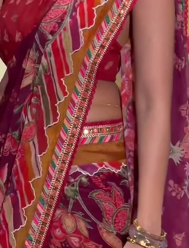 Anupama Parameswaran — The waist belt at native resolution — mustard ground, multicolour braid, mirror trim