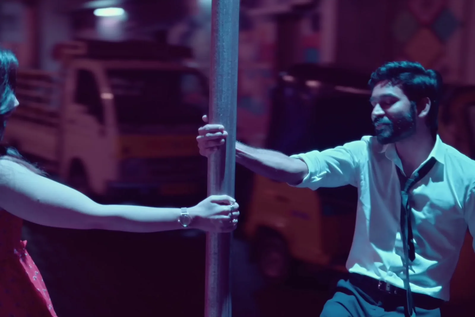 Dhanush — The whole fit standing — shirt, tie, trousers, belt, and nothing else
