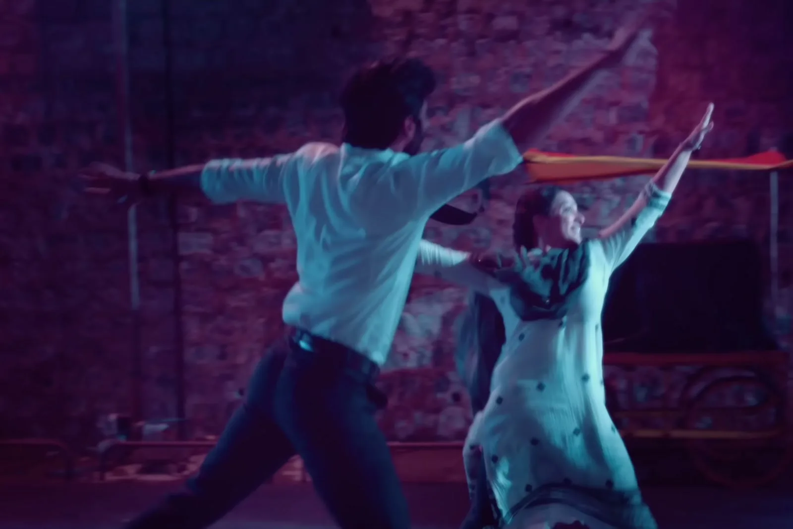 Dhanush — In motion, and how loosely the shirt actually sits