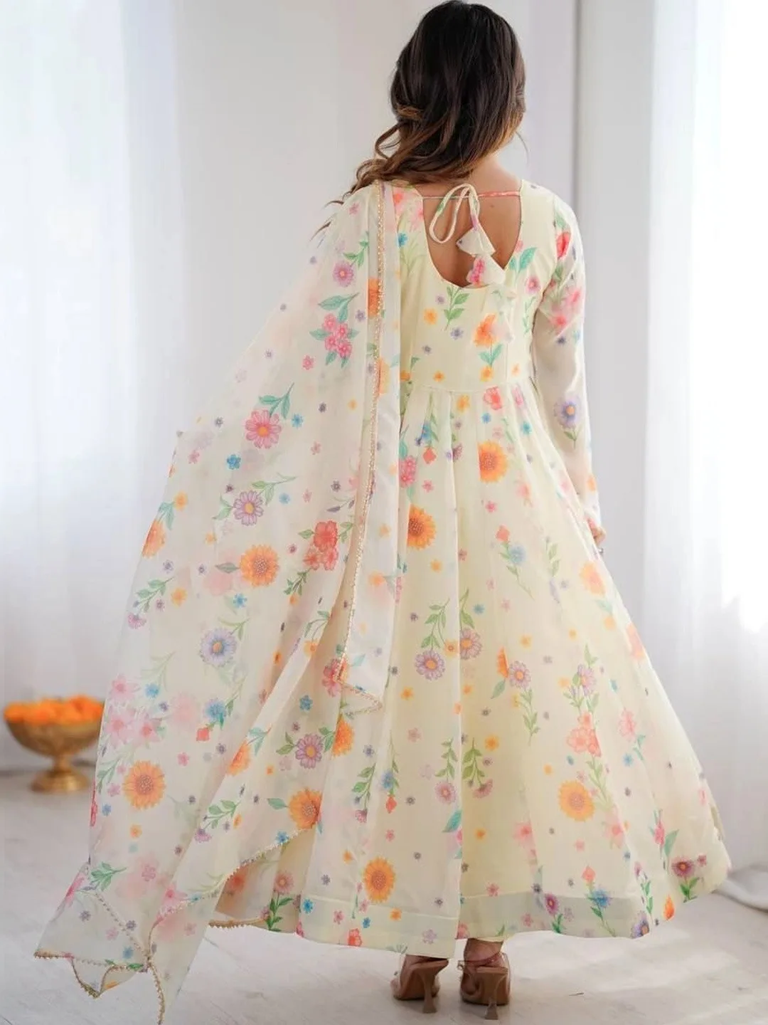 Kurtibella Our second pick under ₹2,000 — off-white printed anarkali with trousers and dupatta