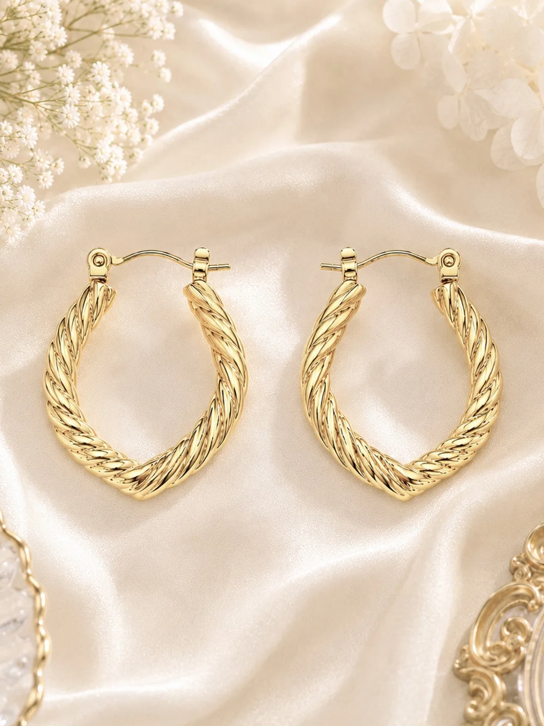 Gold twisted hoop earrings