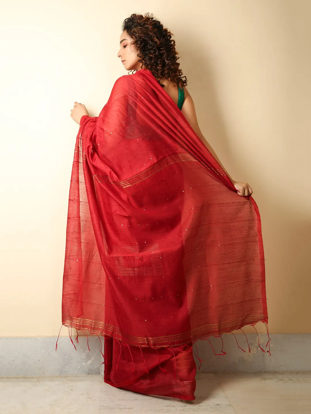 Charukriti Our pick under ₹900 — plain red pure-cotton saree, blouse piece included