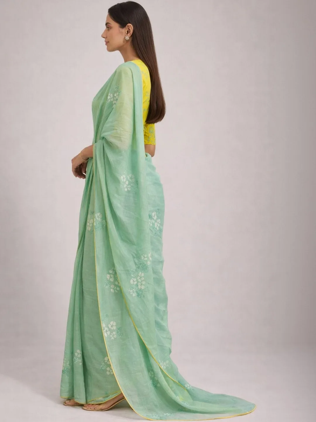 AWRIYA Our pick under ₹1,400 — sheer sea-green pure-cotton saree, blouse piece included