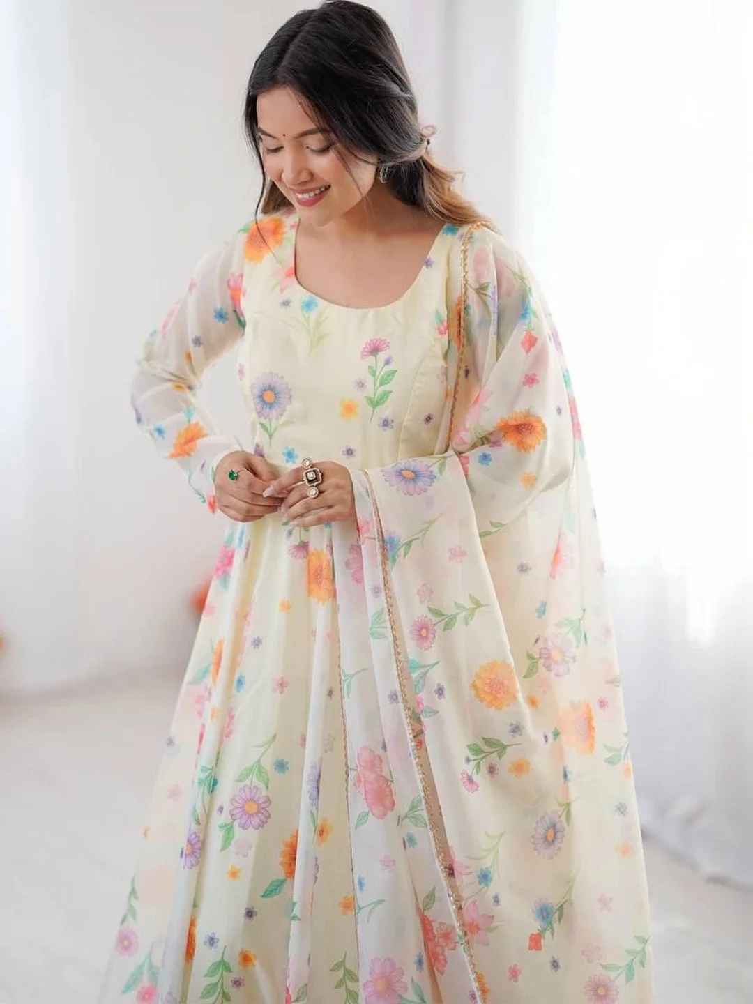 Kurtibella Our second pick under ₹2,000 — off-white printed anarkali with trousers and dupatta