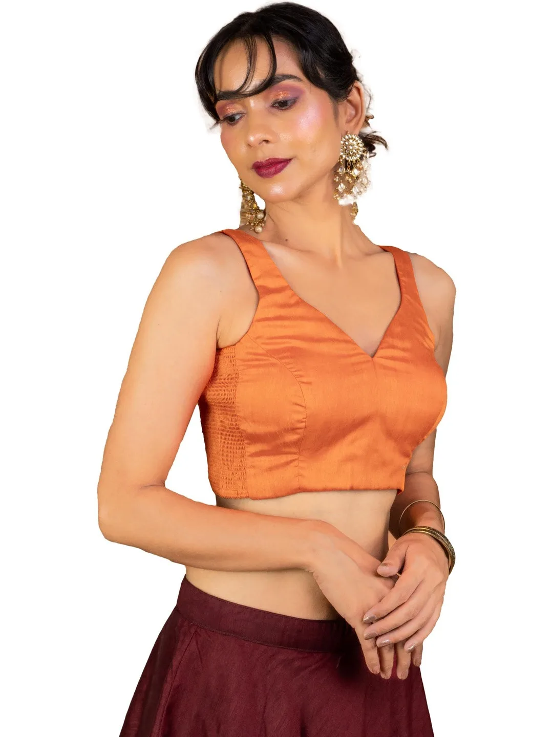 FIGURES DESIGNER Sleeveless deep-V solid orange blouse