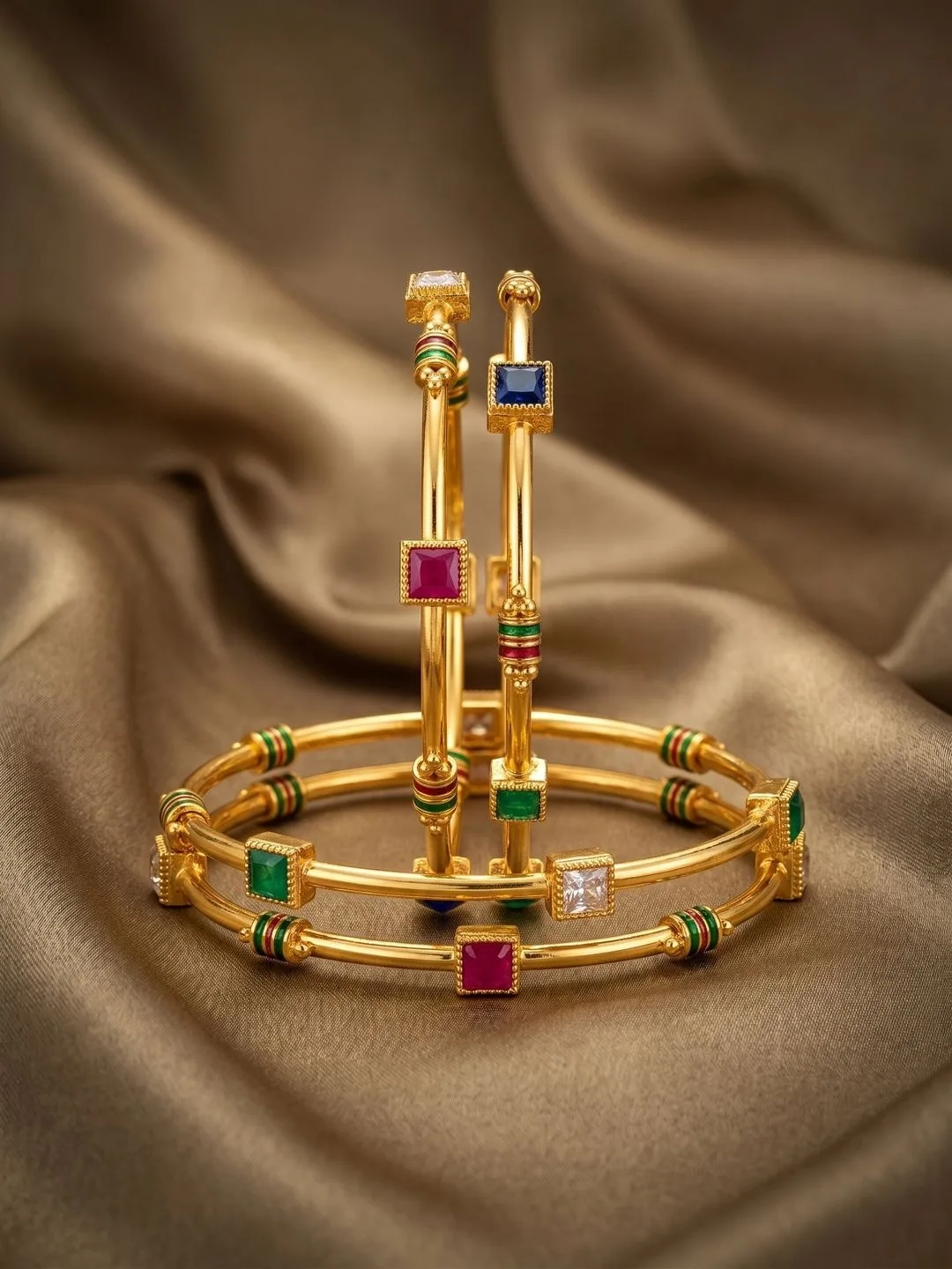 Our pick for the colour in it — four enamelled gold-plated bangles