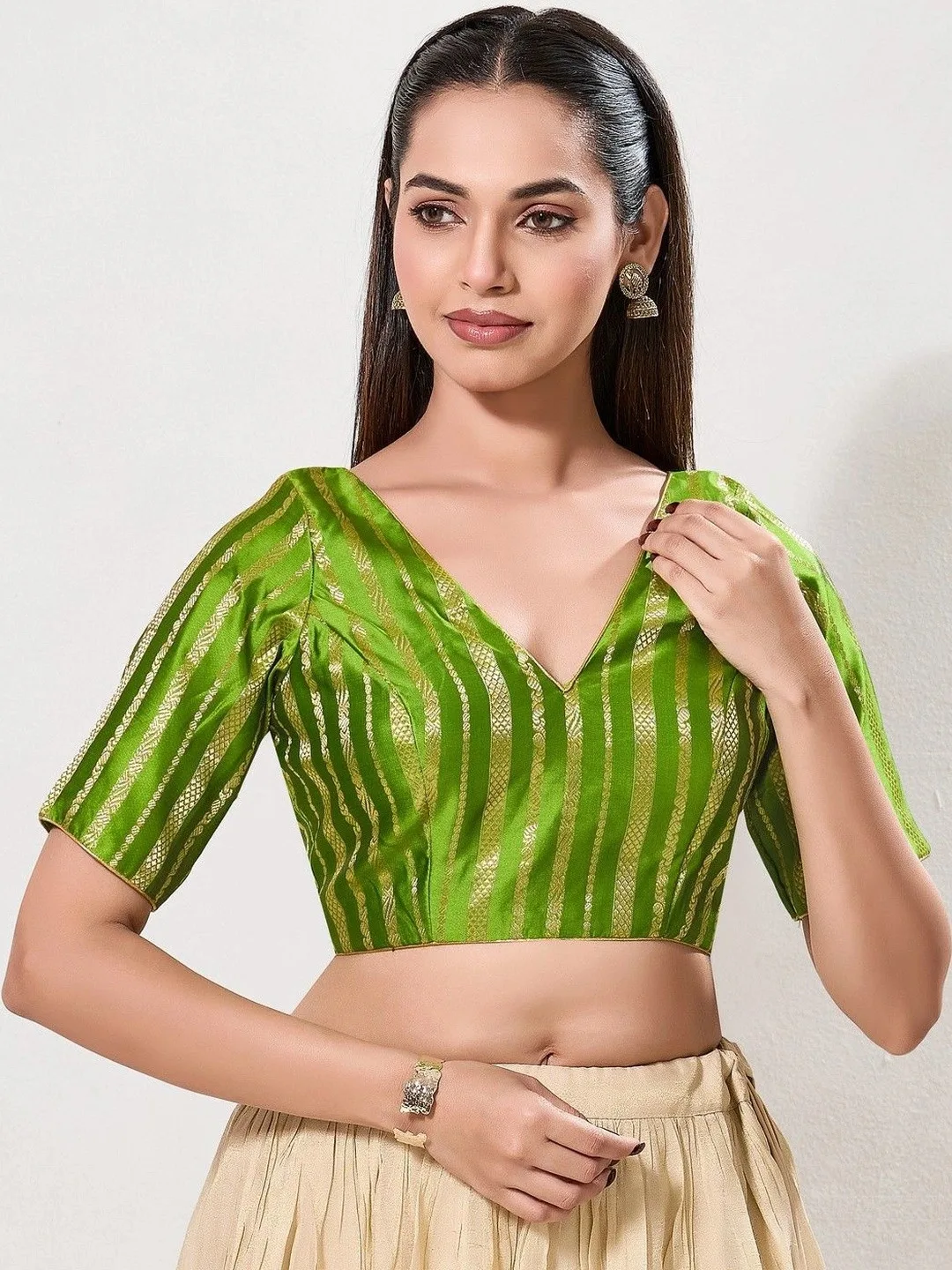VAMAS - THE DESIGNER BLOUSES Green zari-striped saree blouse