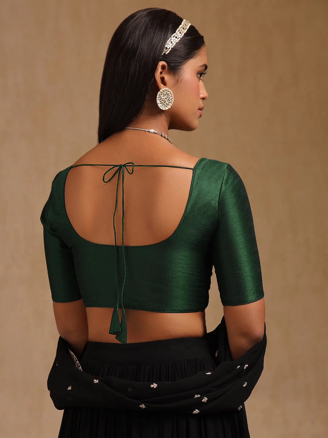 Soch Our pick under ₹1,200 — plain green U-neck blouse, short sleeves