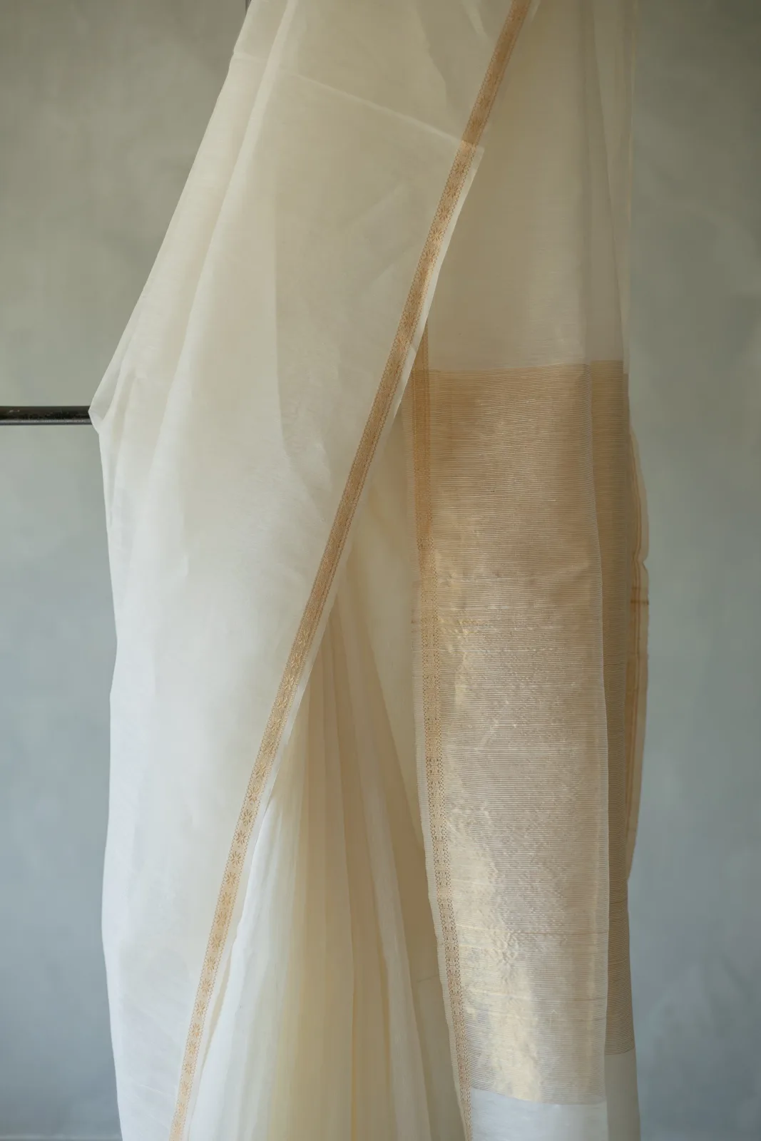 Neela by Anu Vardhan White silk-linen saree with a small gold zari border