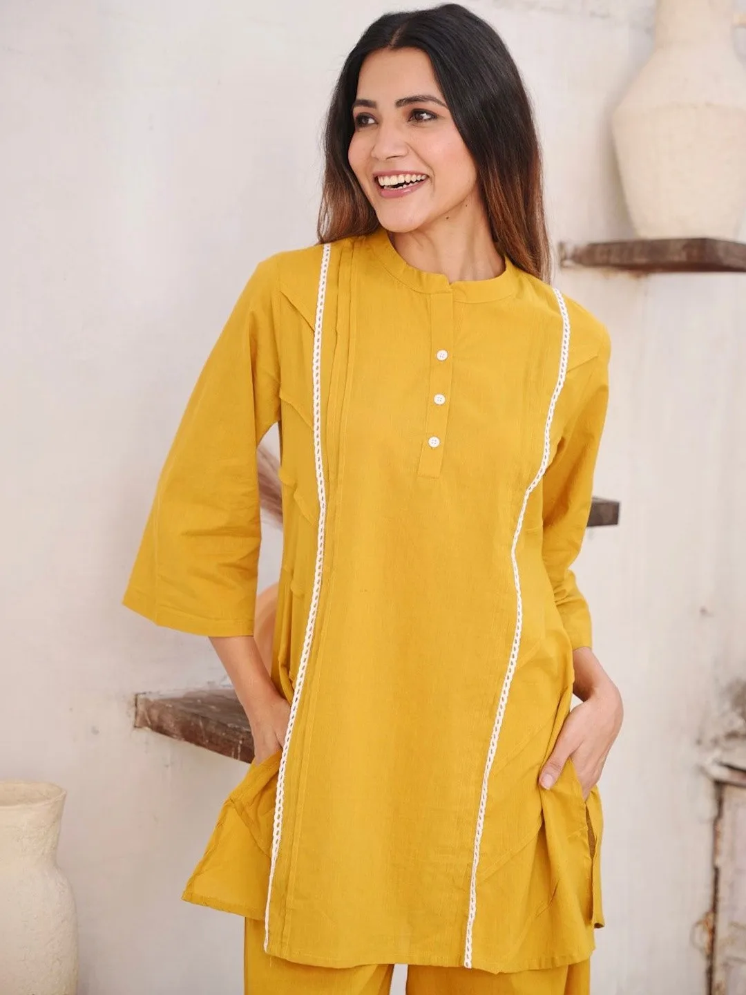 GULABI DORI Our pick under ₹2,300 — mustard kurti and palazzo set with ivory trim