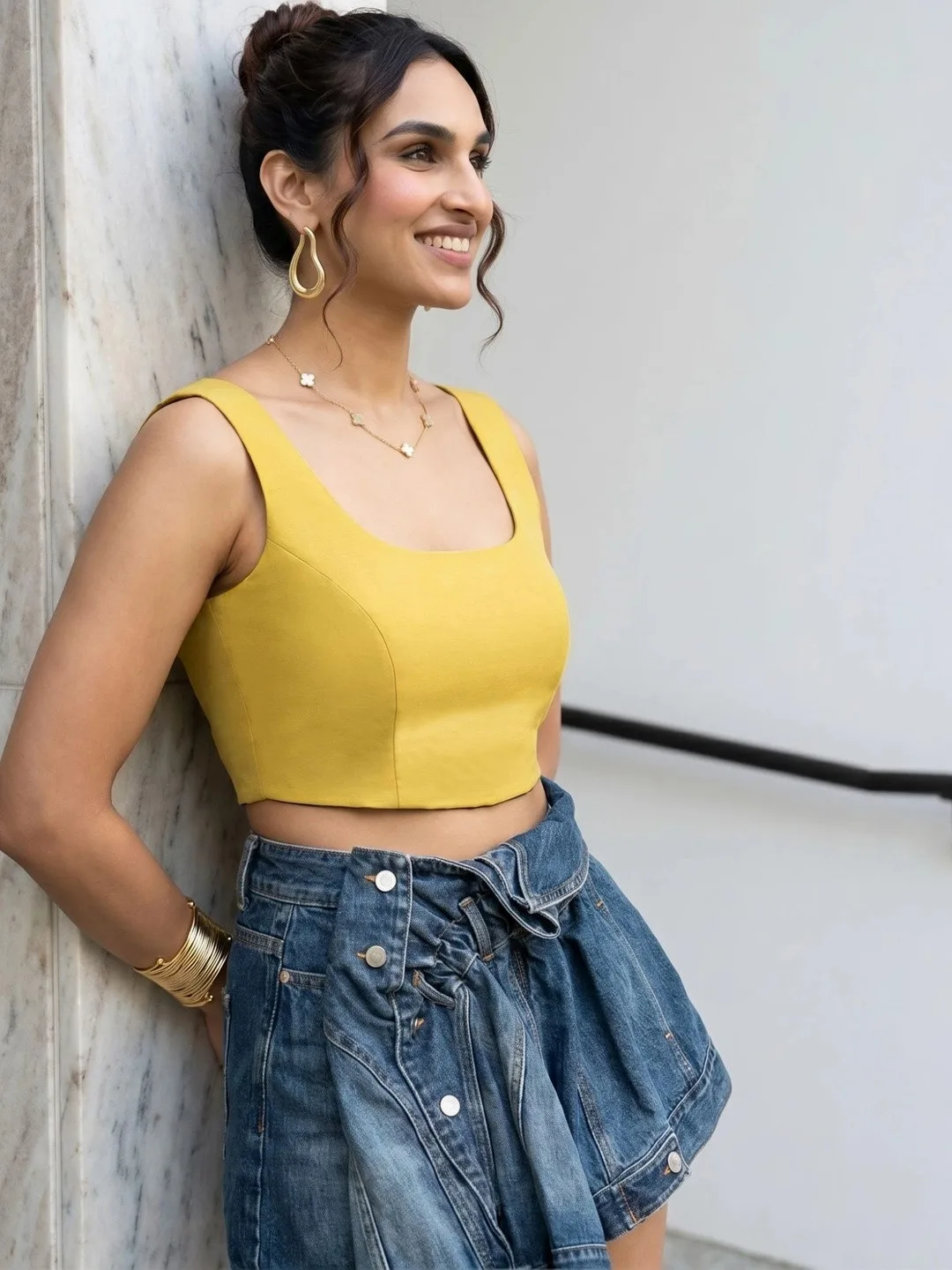 Aanyor Our pick under ₹700 — plain mustard sleeveless blouse, round neck