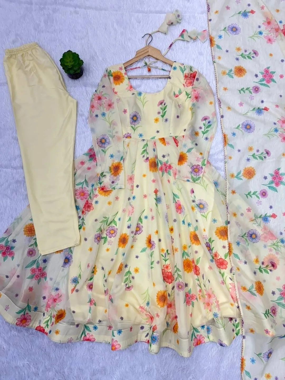 Kurtibella Our second pick under ₹2,000 — off-white printed anarkali with trousers and dupatta