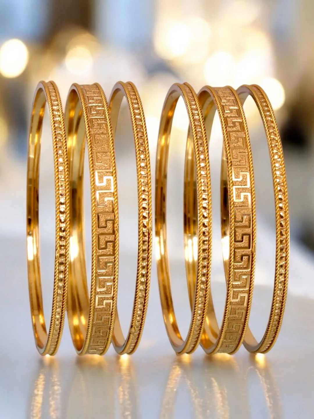 LUCKY JEWELLERY Stacked gold-plated bangles, set of six