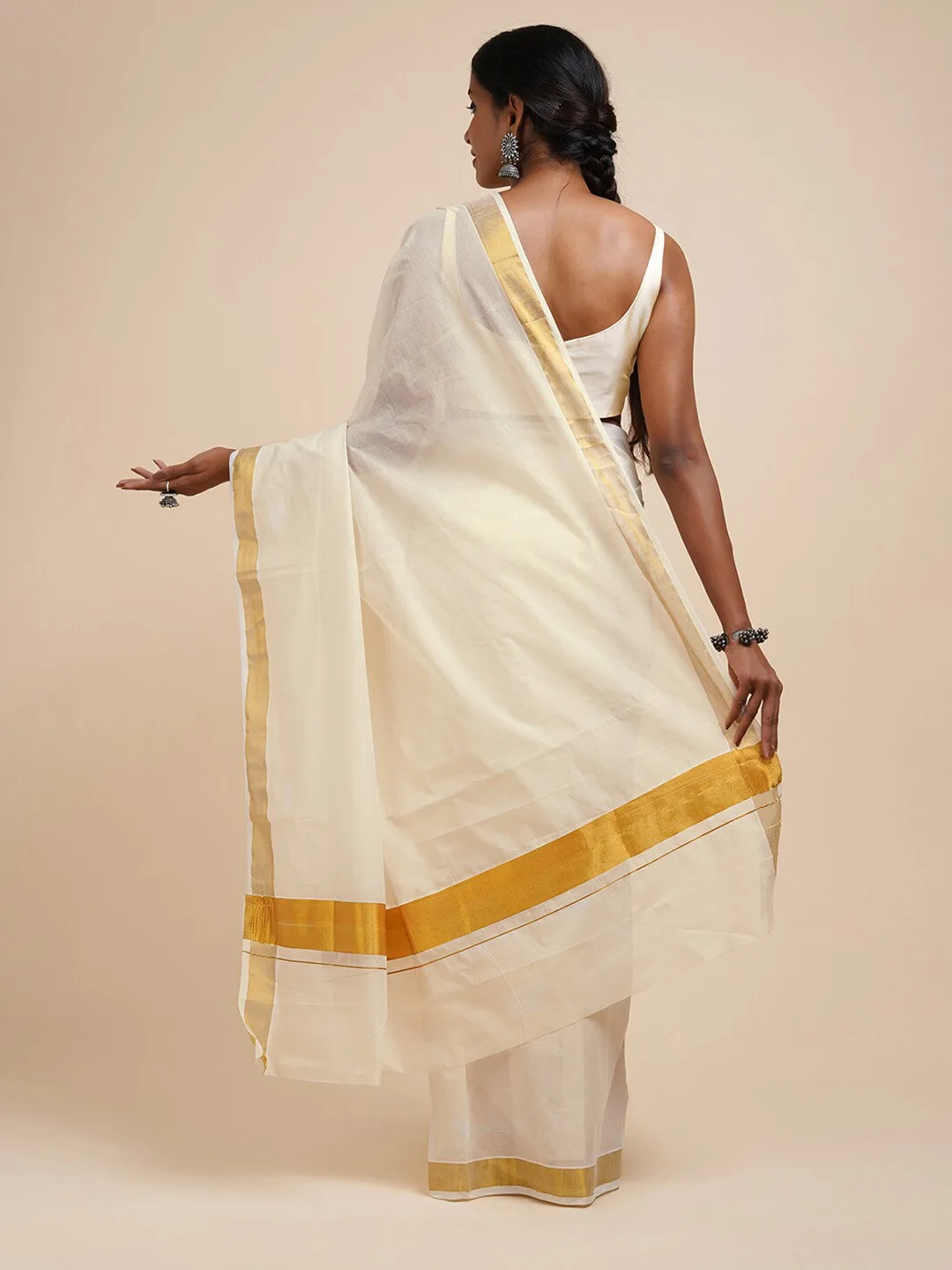 TEEJH Our pick under ₹800 — white kasavu saree with a thin gold zari border