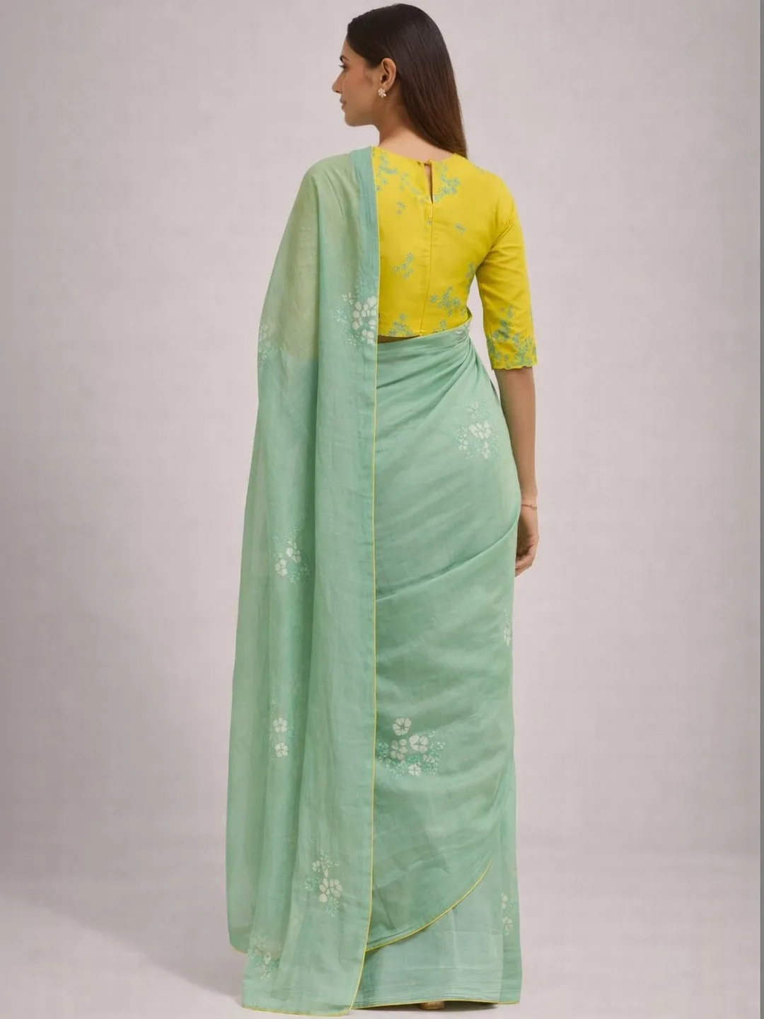 AWRIYA Our pick under ₹1,400 — sheer sea-green pure-cotton saree, blouse piece included