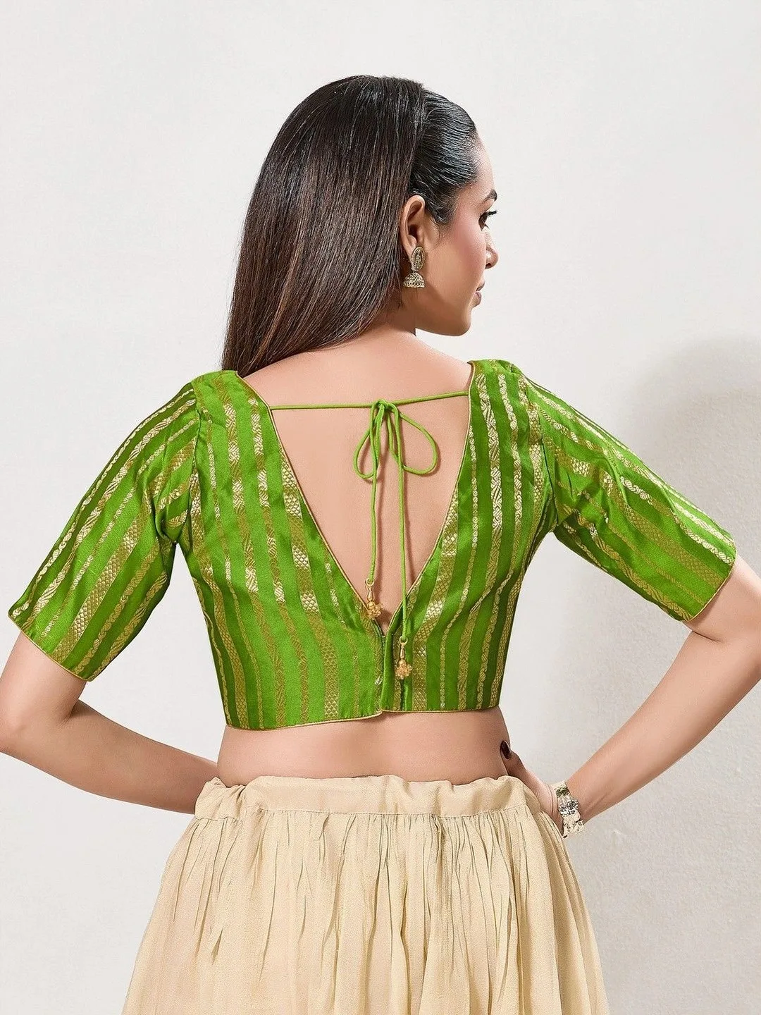 VAMAS - THE DESIGNER BLOUSES Green zari-striped saree blouse