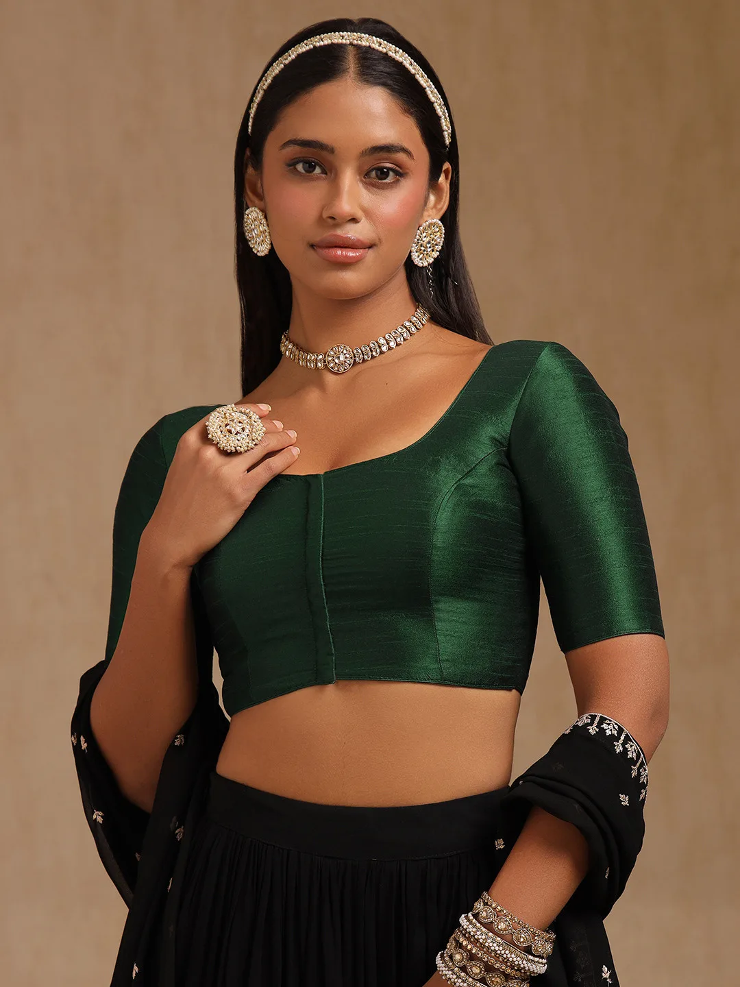 Soch Our pick under ₹1,200 — plain green U-neck blouse, short sleeves