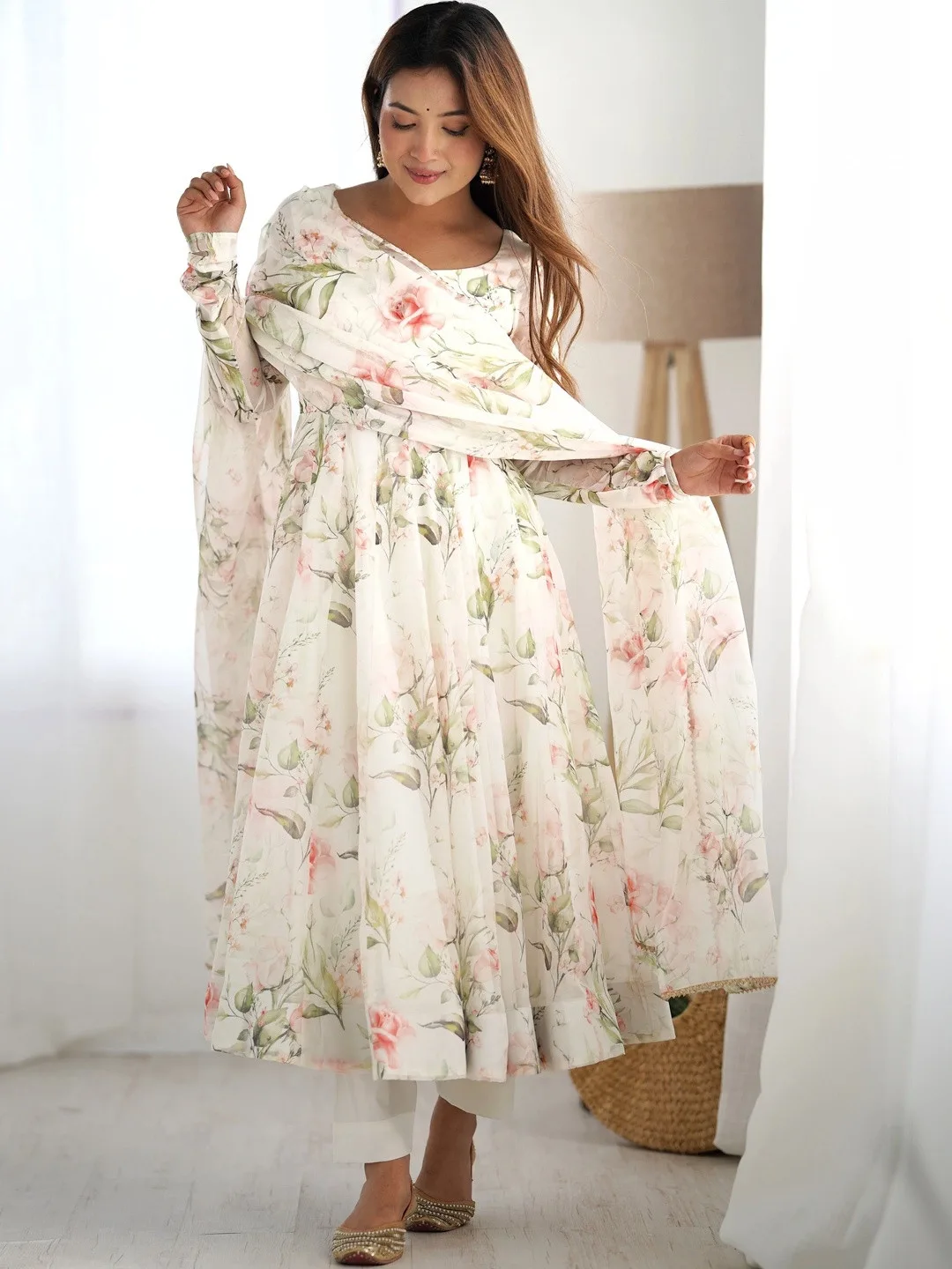 Our pick under ₹2,000 — off-white floral kurta with trousers and dupatta