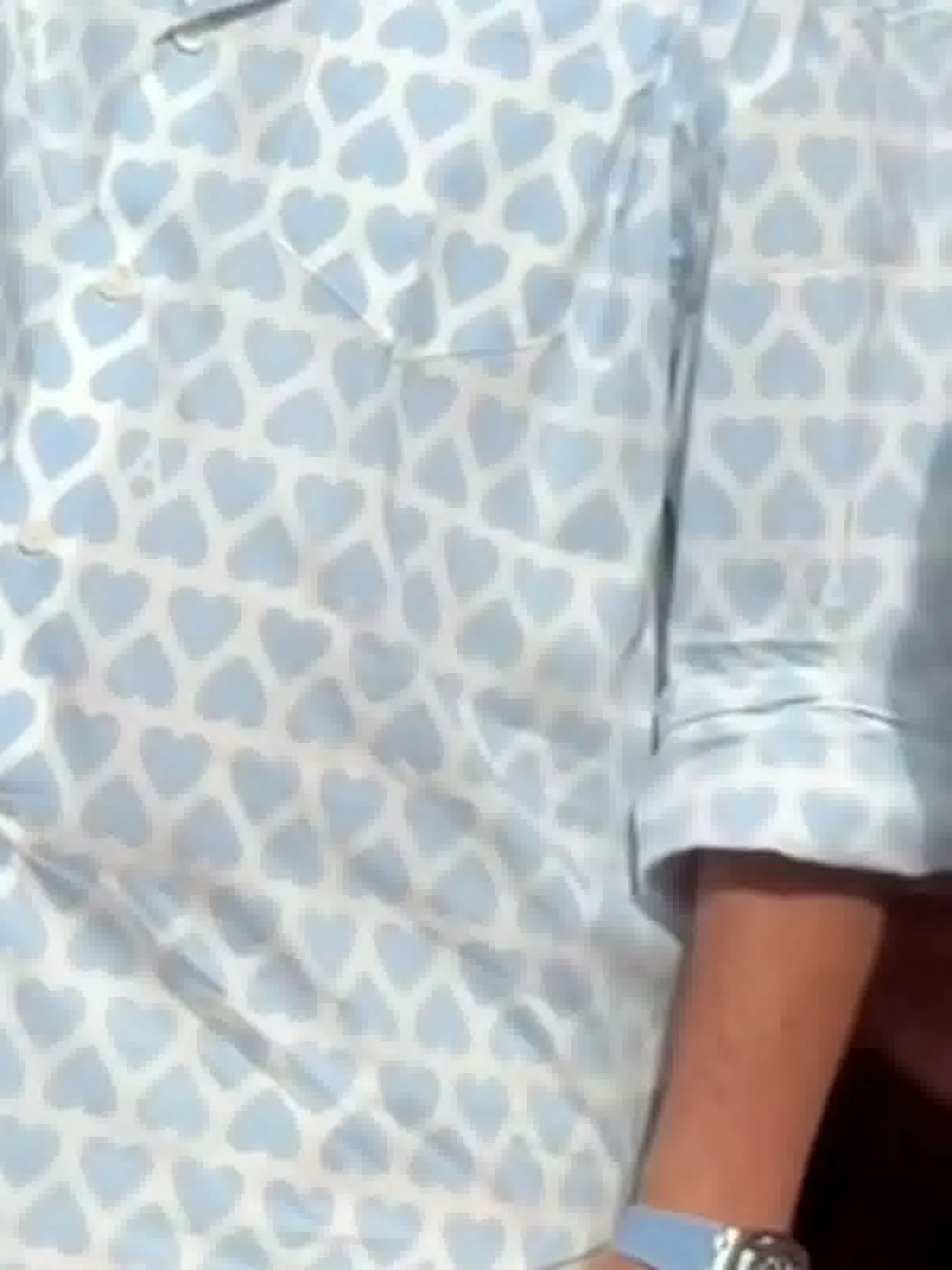 Mammootty — The patch pocket at the left chest, the tonal cream buttons, and the deep roll he has put in the long sleeve