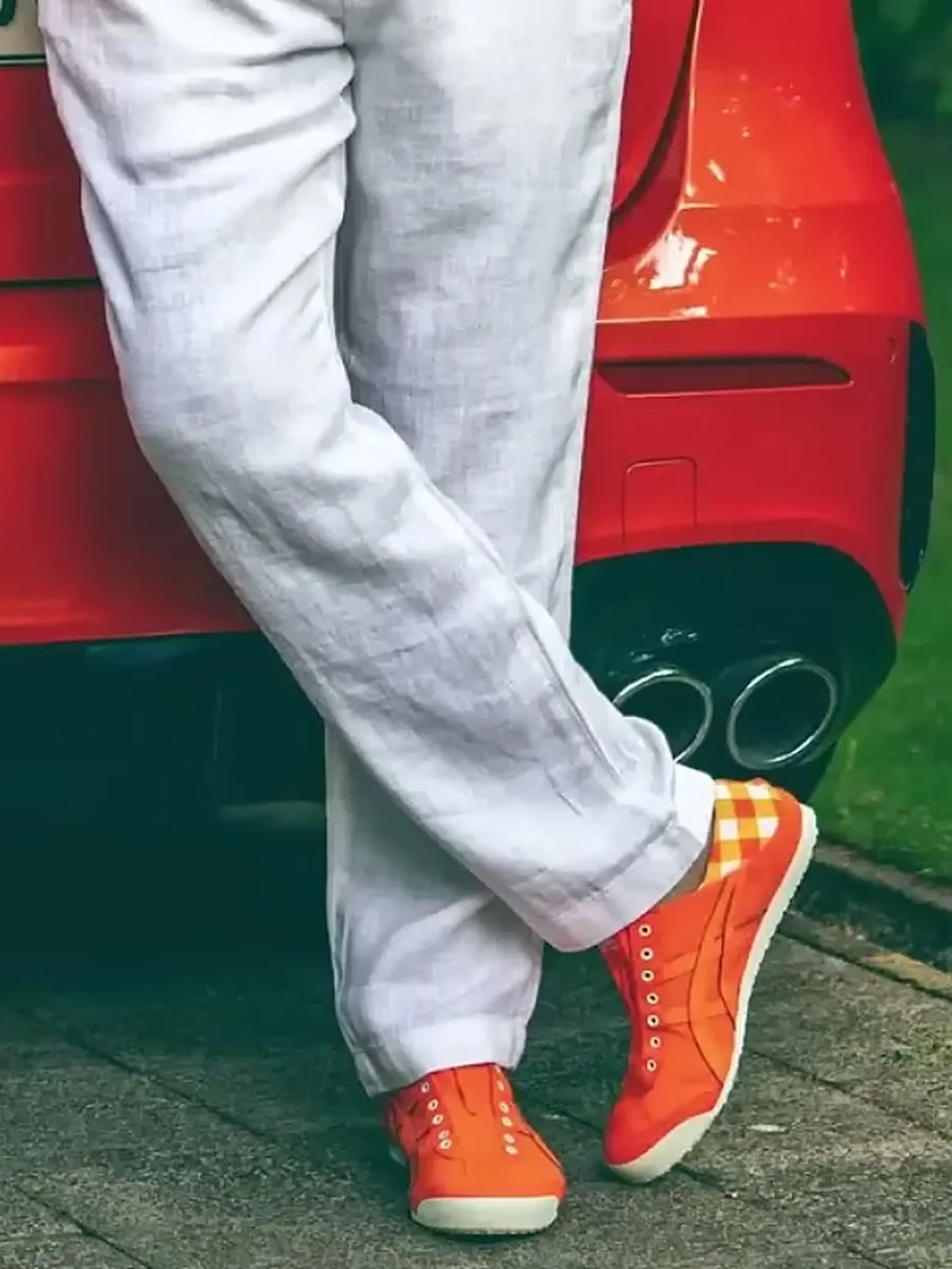 Mammootty — Turned-up linen hems over the orange sneakers — the piece we could not price