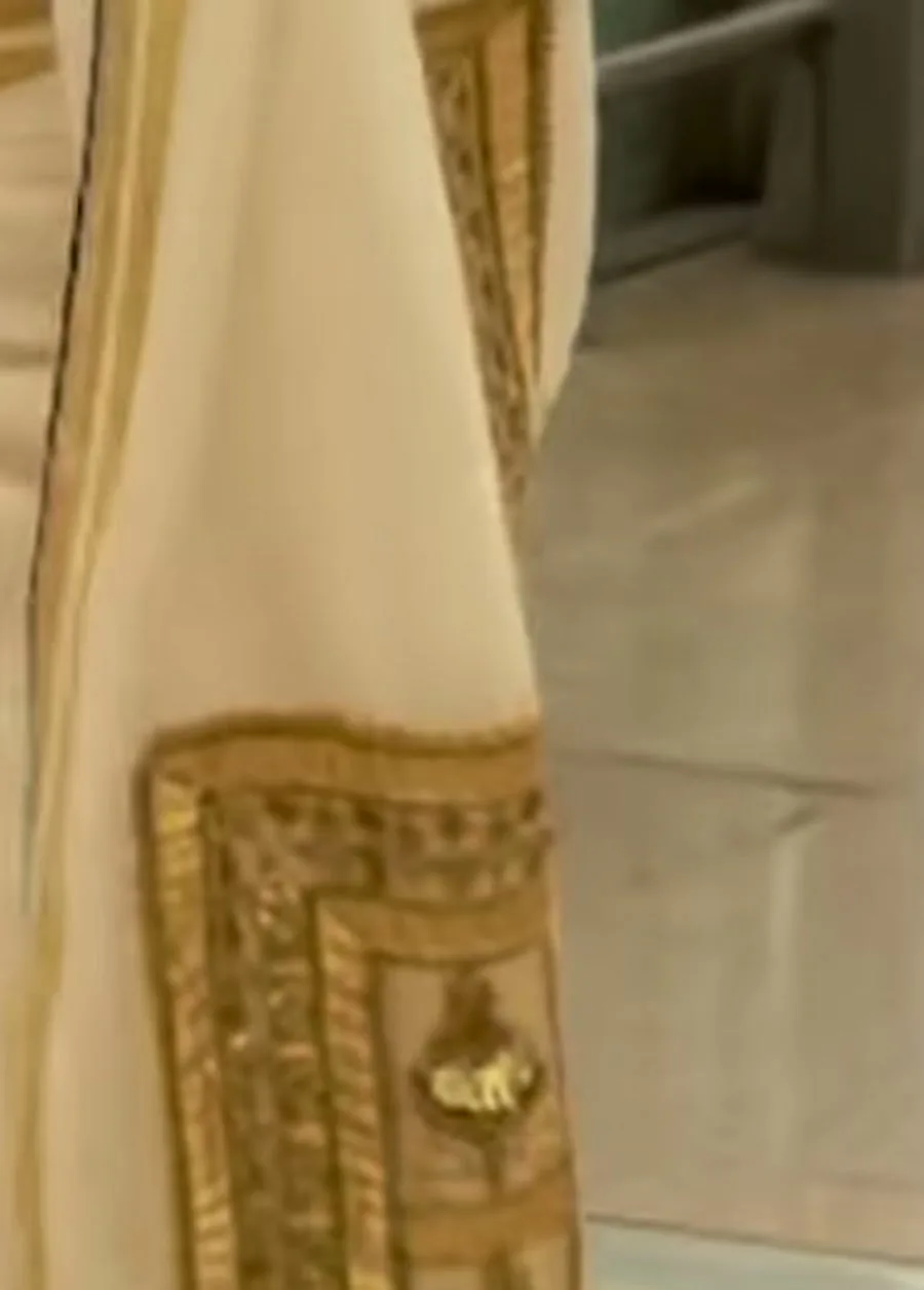 Keerthy Suresh — Close on the pallu end: a framed rectangular panel of gold gota work
