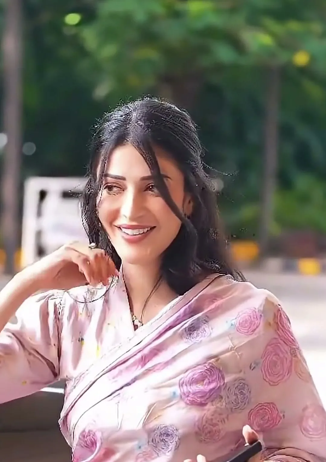 Shruti Haasan — The ranunculus print across the pallu, at the car