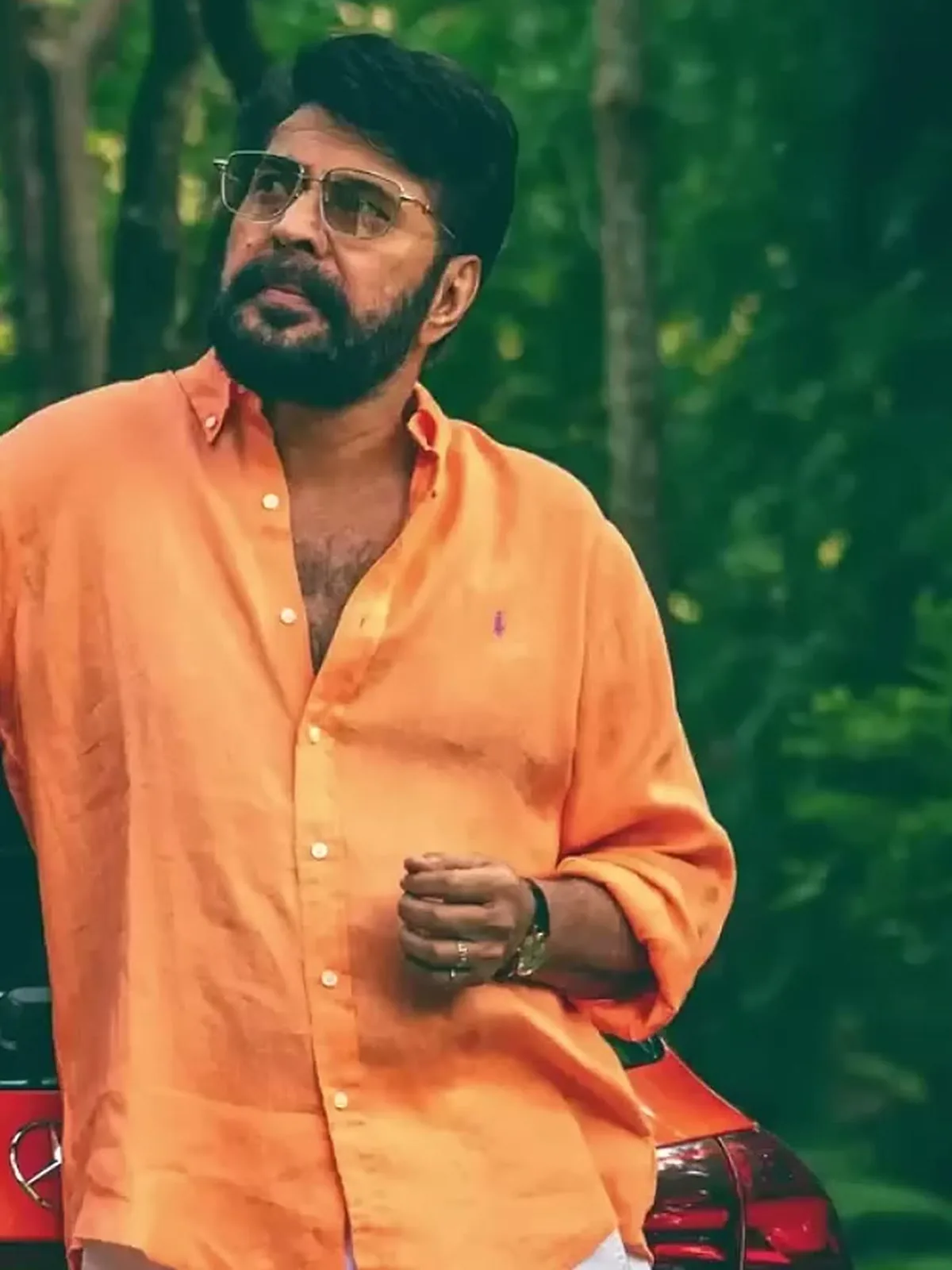 The orange Polo Ralph Lauren linen shirt — Mammootty