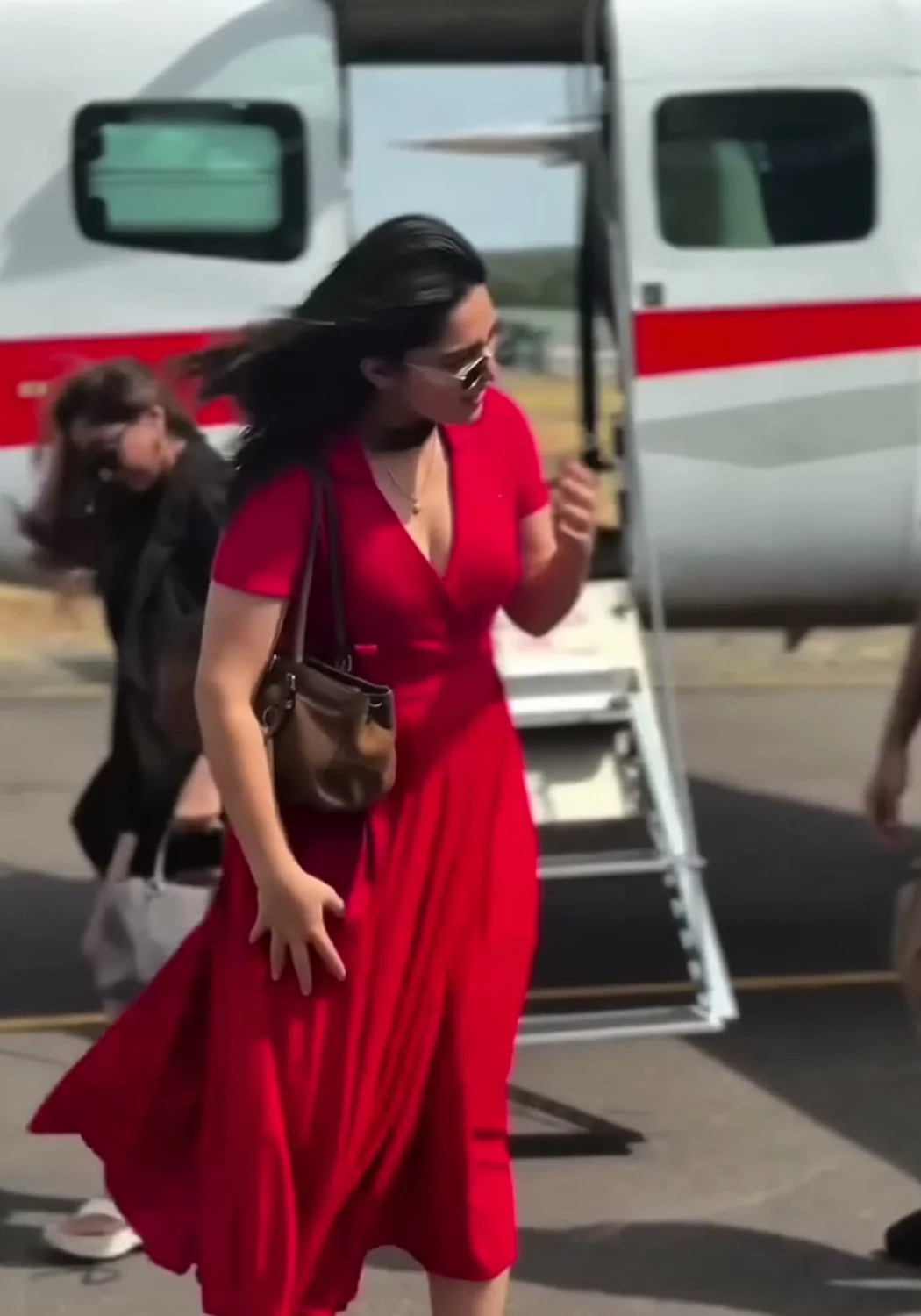 The red wrap dress — Kayadu Lohar