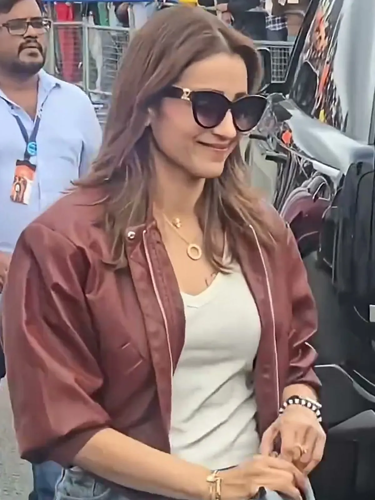 The oxblood leather bomber at Silverstone — Trisha Krishnan