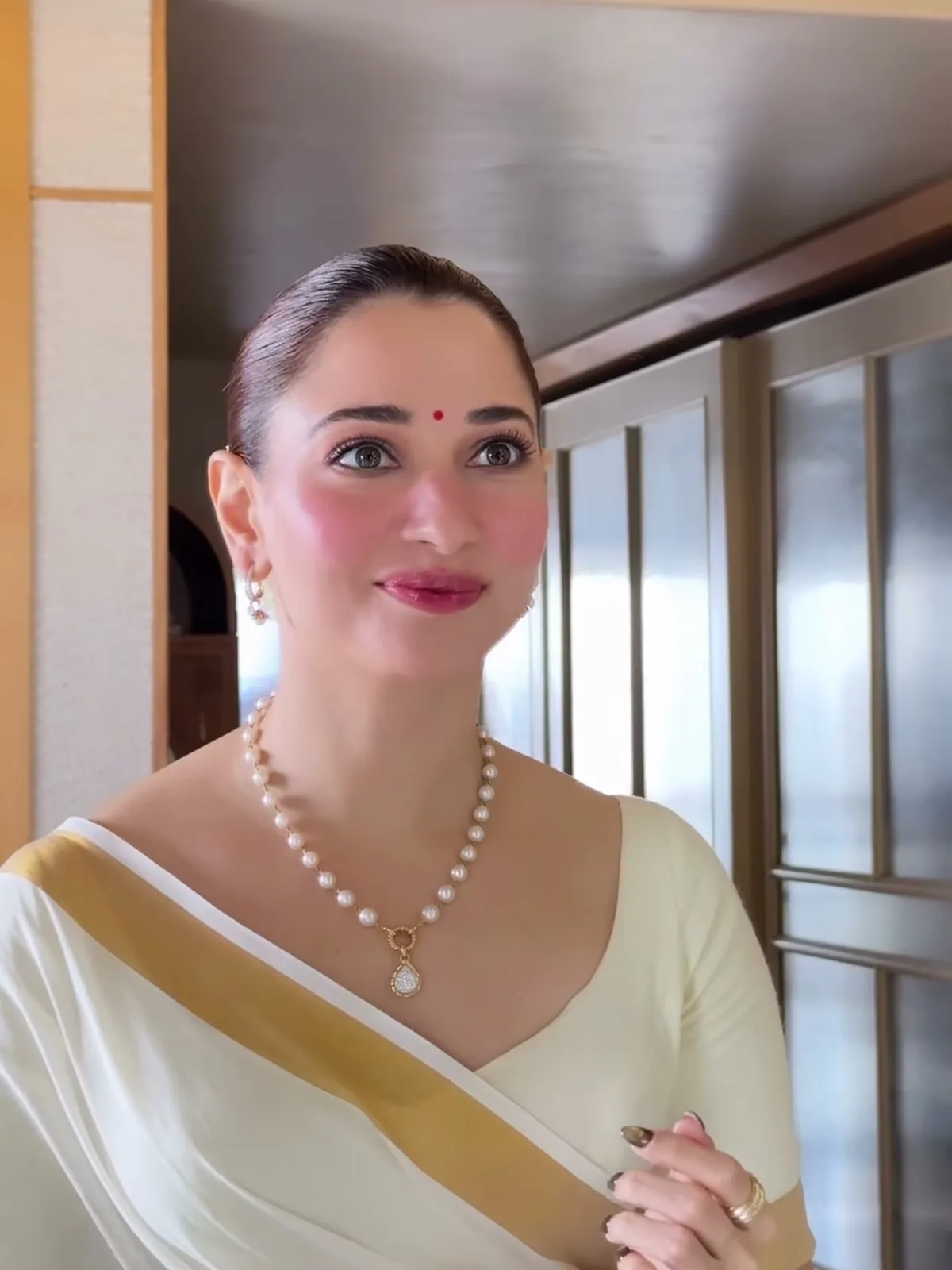 The Onam pearls and the cream kasavu — Tamannaah Bhatia