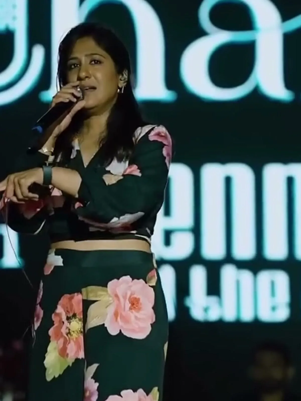 Shweta Mohan — Mid-song: the blouson sleeve and its elasticated cuff, and the smartwatch that is not part of the look