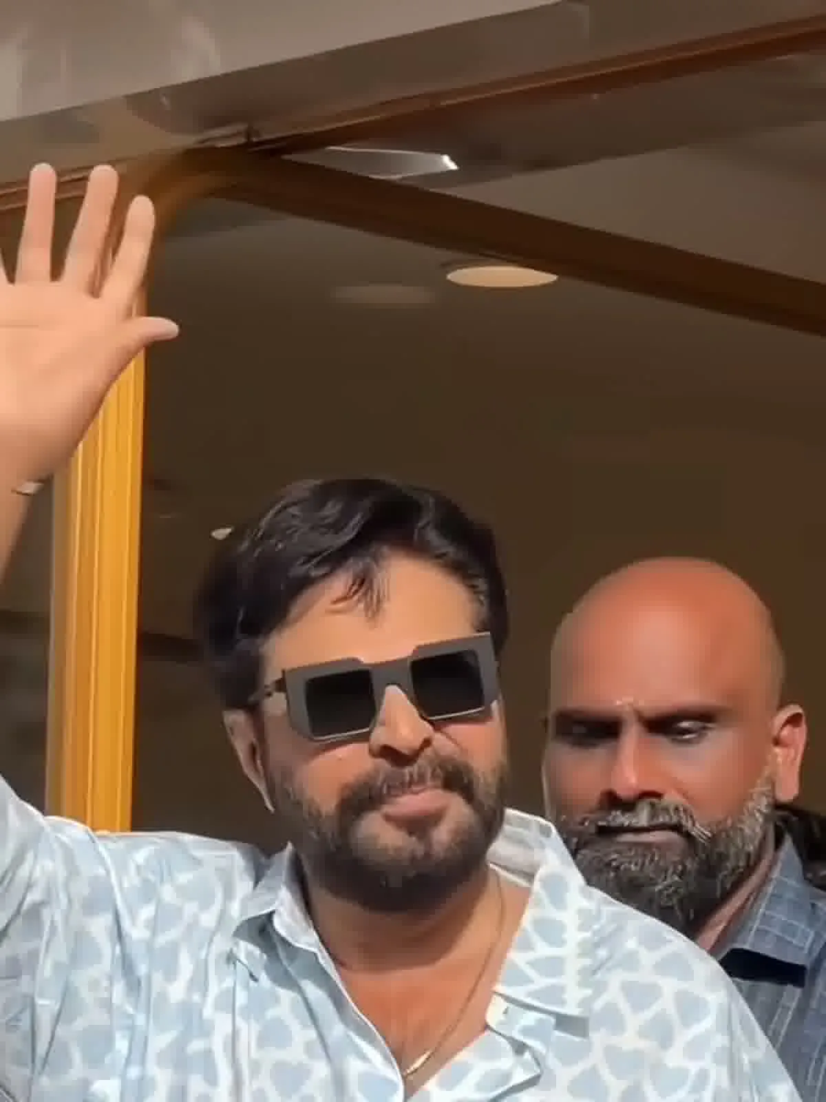 The sky-blue heart-print shirt — Mammootty