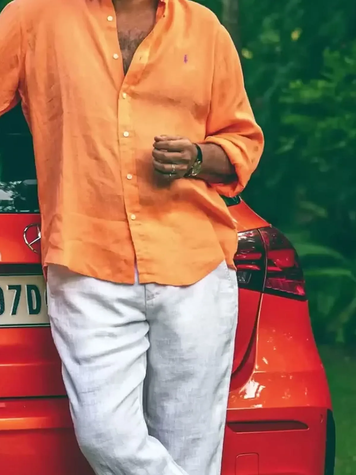 Mammootty — The relaxed cut, worn untucked over white linen trousers