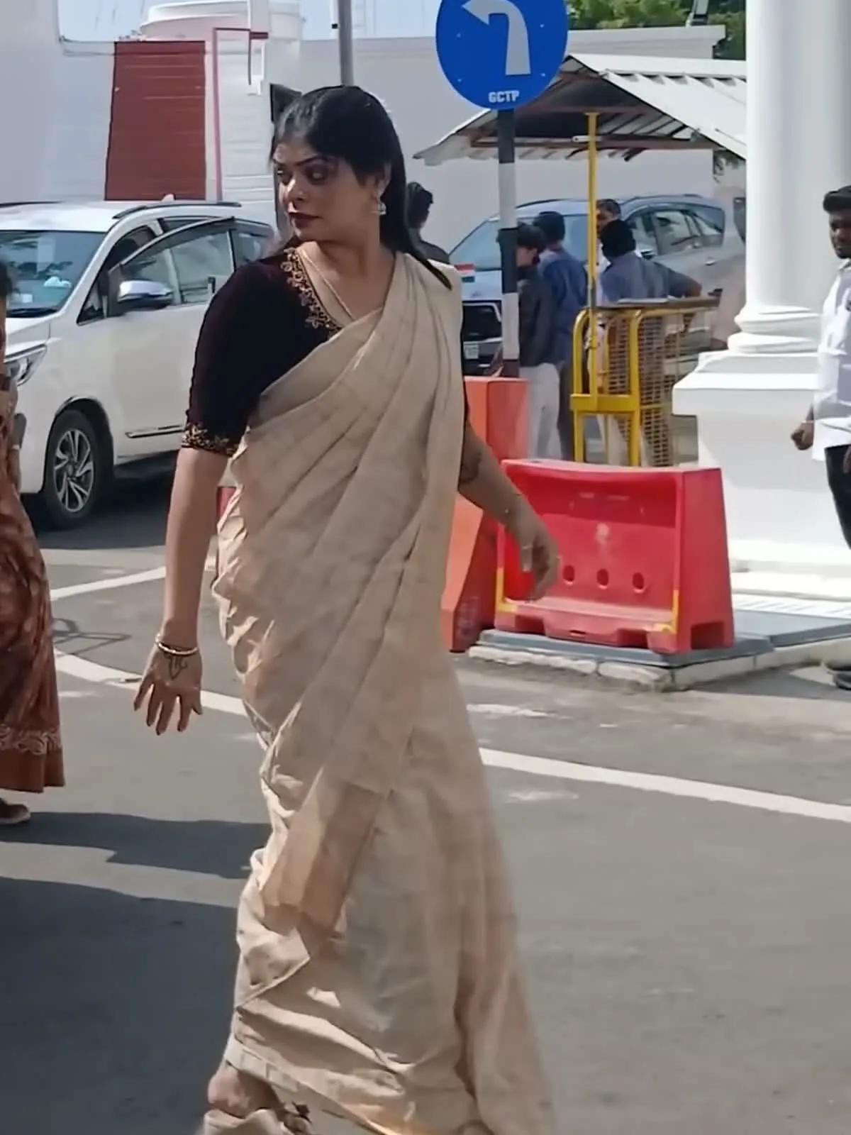 Kanimozhi Santhosh — The sand body against the wine sleeve, which is the whole colour idea of the outfit