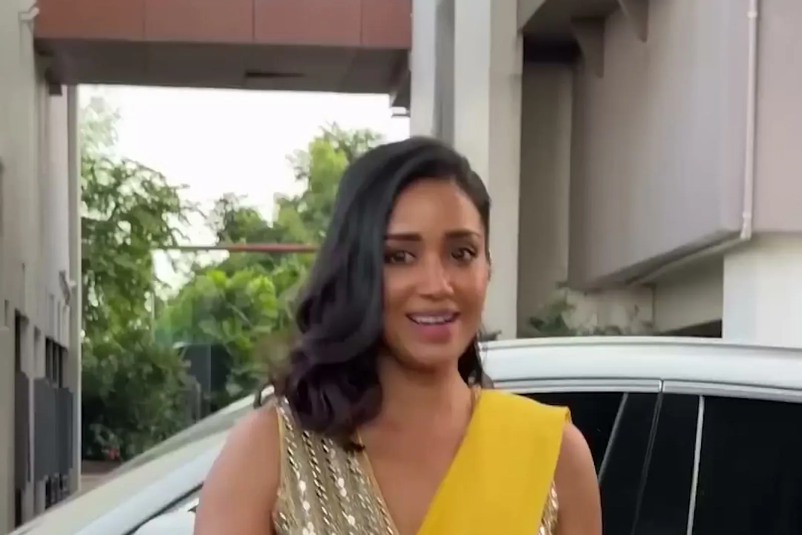 Nivetha Pethuraj — Waving as she steps out