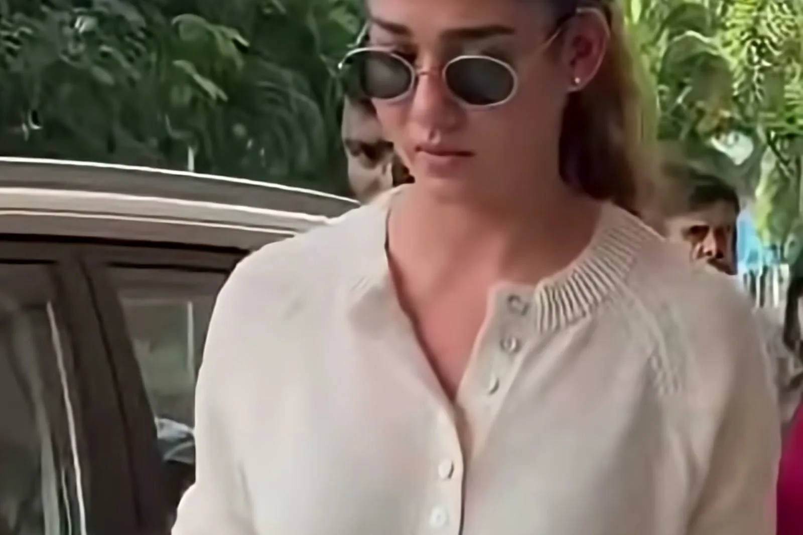 Nayanthara — Three-quarter — how low and soft the raglan shoulder sits
