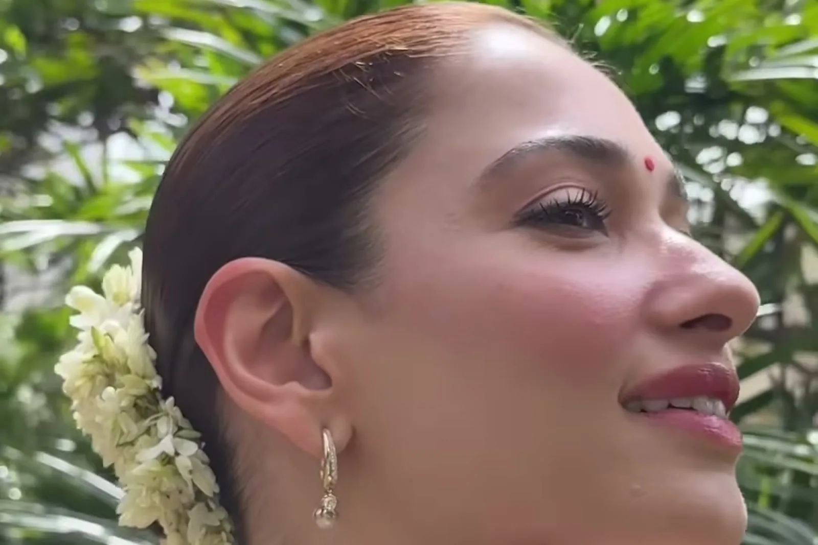 Tamannaah Bhatia — Side on: the Crescent Climbers, and the rope of mullapoo wound through the bun