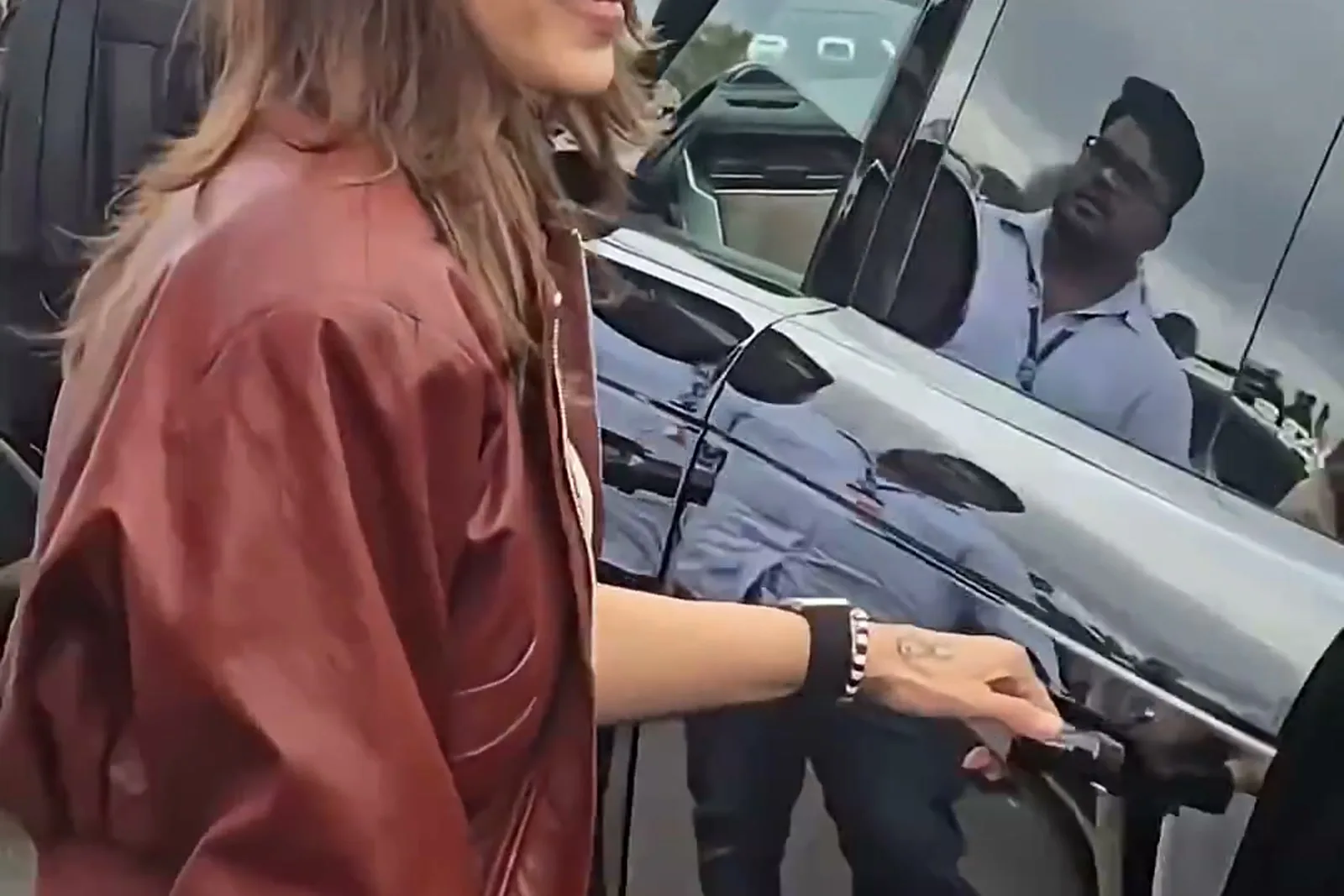 Trisha Krishnan — From the side — how far the sleeve is pushed up, and how short the jacket sits