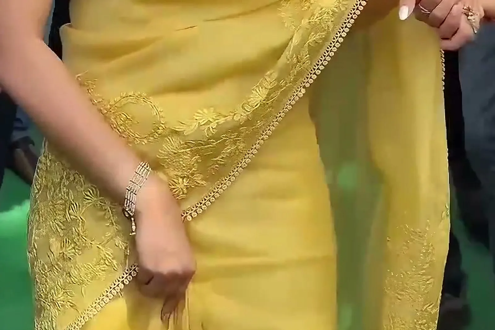 Keerthy Suresh — The border at the hem — floral dori embroidery worked tonally, the same yellow-gold as the ground
