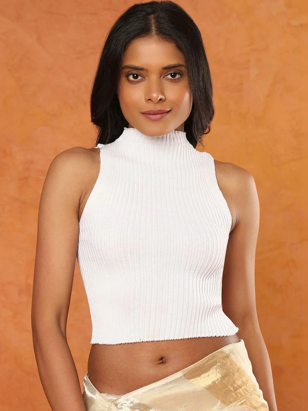 KALINI Sleeveless high-neck blouse